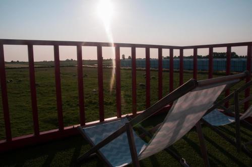 Hihahut De Zonnepost in เลเดอร์ดอร์พ