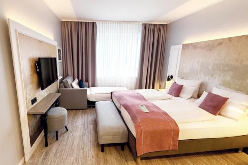 Standard Family Room with One Queen Bed and One Sofa Bed image 4