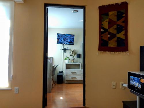 Habitación doble matrimonial e individual con baño compartido in Lomas de Angelopolis, Mexico