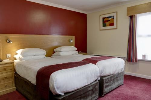 Burn Hall Hotel Sure Hotel Collection by Best Western Stop at BEST WESTERN Burn Hall Hotel to discover the wonders of Huby. Featuring a complete list of amenities, guests will find their stay at the property a comfortable one. Free Wi-Fi in all rooms, 24