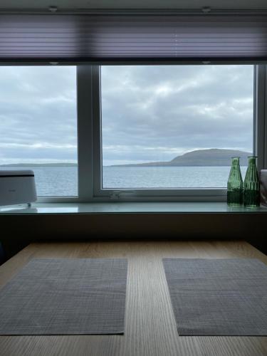 נוף, 2BR Home with Sea Views and Parking - Tórshavn (2BR Home with Sea Views and Parking - Torshavn) in Argir