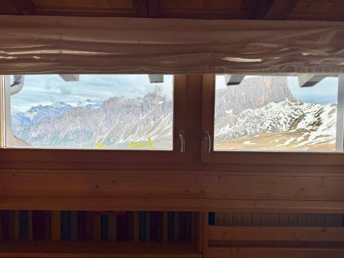 Skats, Esperienza Unica al Passo Giau - Appartamento con Vista Panoramica in Colle Santa Lucia