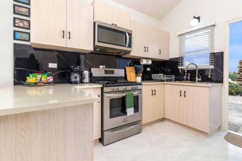 Sunset at ArecaHomes Beach Access Pool and Water Park in Discovery Bay