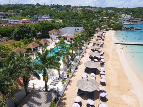 Sunset at ArecaHomes Beach Access Pool and Water Park in Discovery Bay