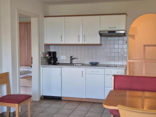 virtuve, Apartmenthaus am Waalweg in Caines