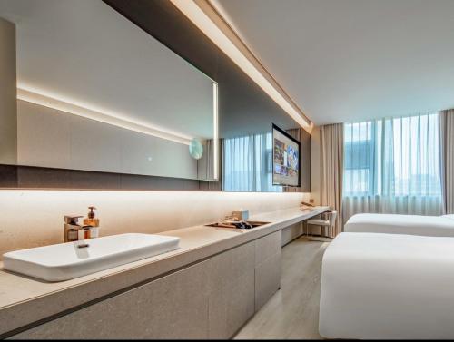 Xi'an Bell Tower Yongning Gate Orange Crystal Hotel – Xi'an City, LA