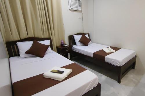 Triple Room room in Jmorino Pension House Palawan City Center