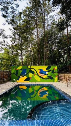 Zwembad, Thennal Junglecamp in Kattikkulam