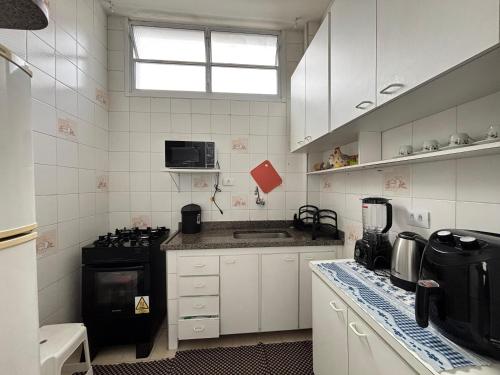 otimo Apartamento Pitangueiras Guaruja bem localizado, 2qts wi-fi near Restaurante Fogao Caipira