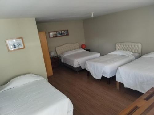 1 double bed, 3 twin beds