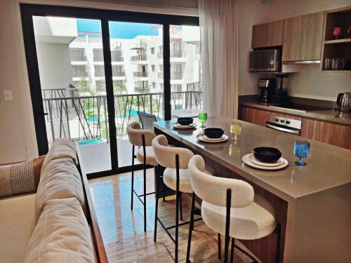 1 BedRoom with King Bed and Balcony with Amenities View - image 5