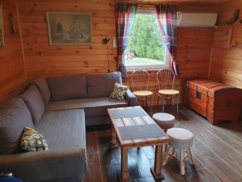 Domek Pod Lasem in Ольштинек