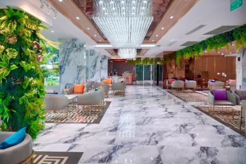 Shared lounge/TV area, Deco Wellness Center in Naklua