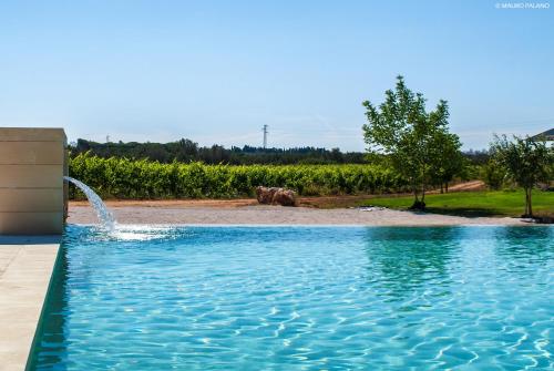 Peldbaseins, Agriturismo Tenuta Kyrios con piscina in Karpidžnano Salentino
