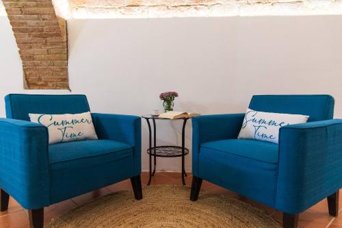 Jagatud salong / TV-ala, Apartment in historic villa with pool and Tennis in Serrungarina