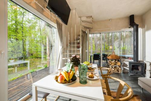 Domek w lesie z jacuzzi, sauną i kominkiem - drewno w cenie pobytu - nad jeziorem Kaszuby (Domek lubiana180 WABI SABI w lesie jacuzzi sauna kominek - drewno w cenie pobytu - nad jeziorem Kasz) in Lubiana