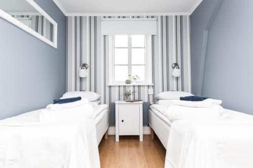 Zimmer mit 2 einzelbetten, gemeinschaftsbad