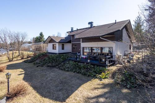 Atmospheric house on riverbank, Rovaniemi