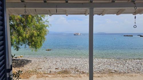 pludmale, AMMOR Beach houses, Nisida in Driopi (Attiki)
