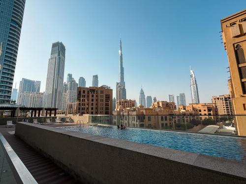 Luxury 2bdr apartment with Burj views & resort amenities, Dubaï