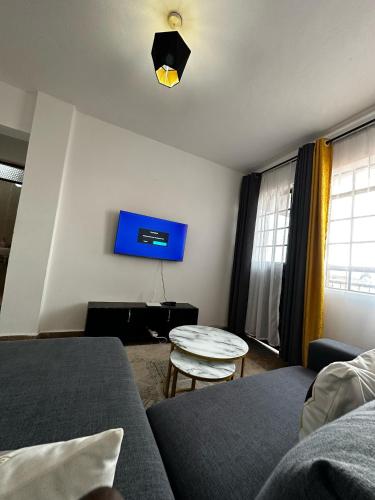 sala de TV, Nano Cozy Homes -1 Bedroom with lift - TRM Drive in Nairobi
