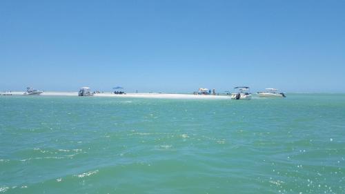 Village Breeze III - Heated Pool, Private Patio, Village and Beach!