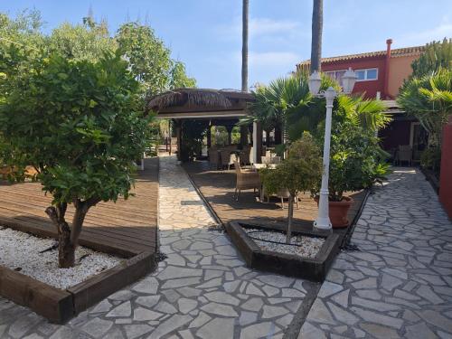 Garden, Alojamiento Cafe Soles in Les Marines Beach
