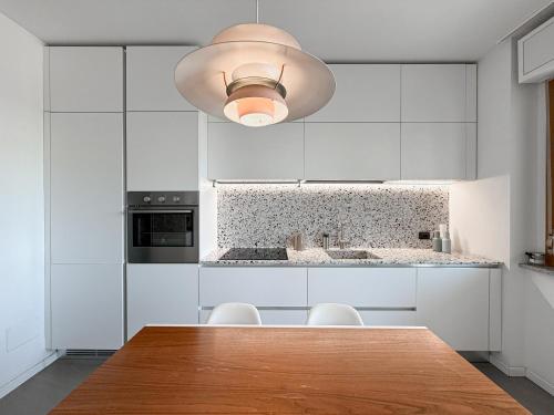 80m2, 7 piano, bilocale con 2 terrazze e 2 bagni in Quartiere Adriano
