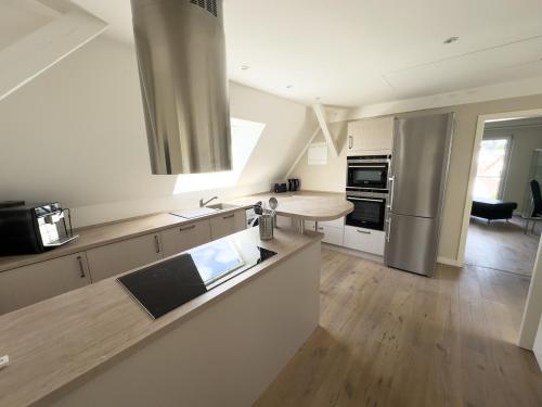Kitchen, Stilvolle Dachgeschosswohnung am Teutoburger Wald in Steinhagen
