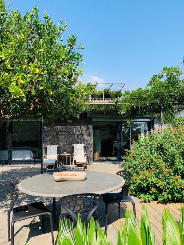 The Cottage in the Citrus Grove, Nunziata