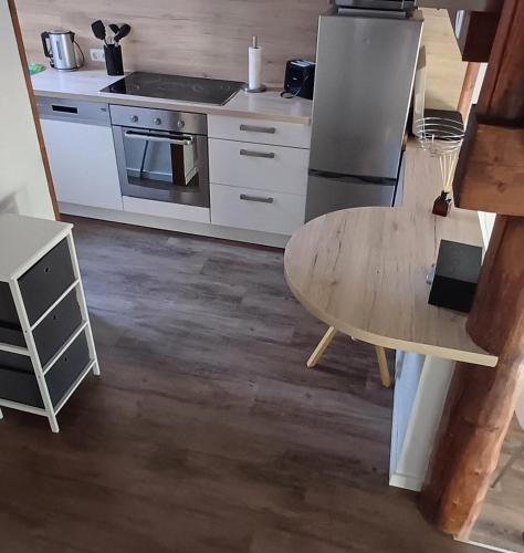virtuve, Ferienhaus 30 am Silbersee mit Badezuber in Frielendorf