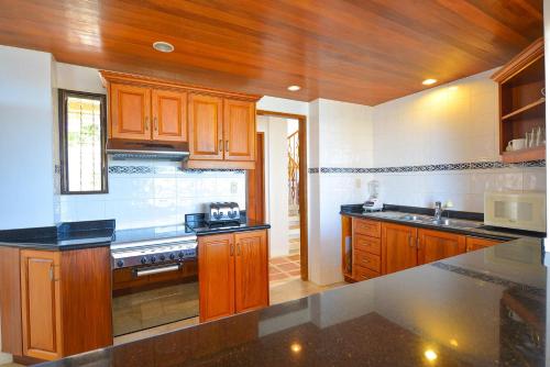 Kitchen, Tropicana Ocean Villas in Diniwid