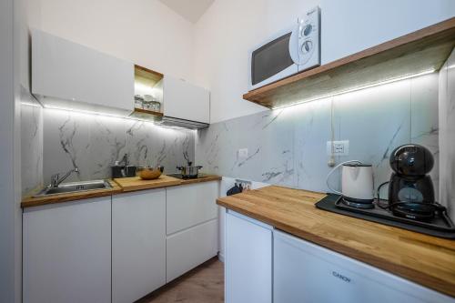 Iekārtas, Appartamento con terrazzo alle porte di Como in Lipomo