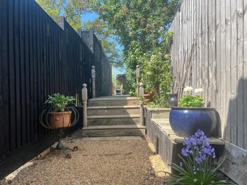 Lavender Lodge - Pool and Hot Tub with sunset views over open fields in Wicklewood
