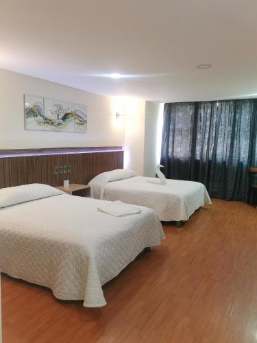 Deluxe Quadruple Room image 1