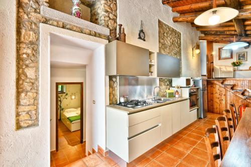 Kitchen, Antica Limonaia by Theater Home in Gargnano