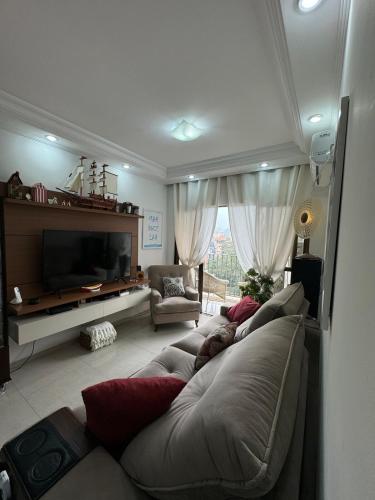 Shared lounge/TV area, Apt 50m Praia do Tombo - Bandeira Azul Guaruja in Praia do Tombo