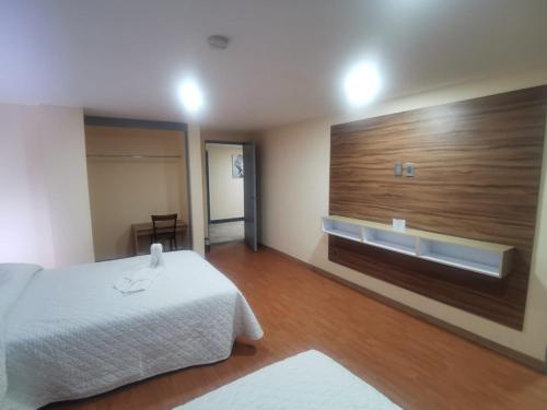 Deluxe Quadruple Room image 6