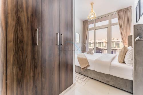 Community and Pool View 3BR Townhouse, Minutes from Desert Camp,DAMAC Hills 2 Amargo by Deluxe Holiday Homes, Dubaï (photo 9)