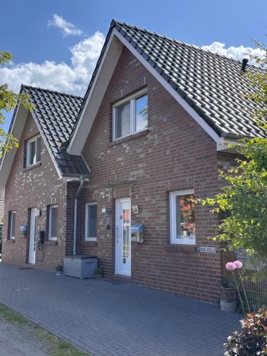 Feriendomizil Dornum Haus Willy mit Wintergarten und Wallbox in Dornum, Deutschland