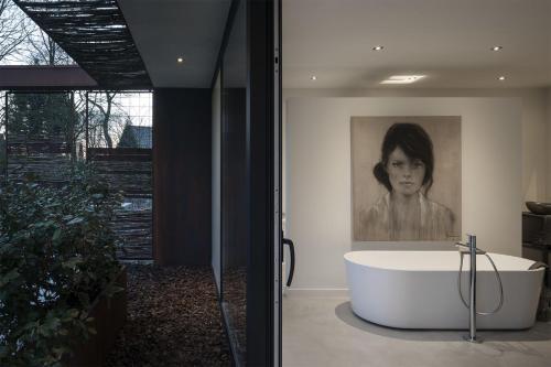 Stalen Boshuis by Droomvilla in Остерхут