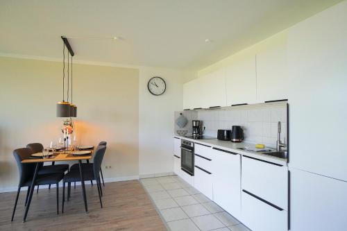 廚房, Moderne Ferienwohnung N°9 Stexwig mit Panorama Schleiblick in 費爾多夫