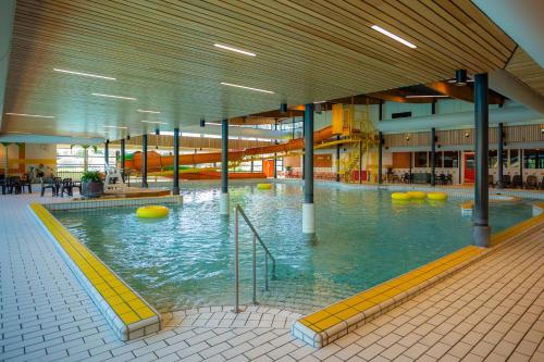 Boshuisje Woodsy Sevenum 6pers - nabij Toverland in เซเวนุม