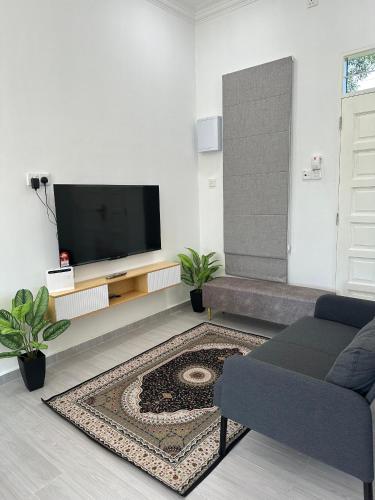 Shared lounge/TV area, e-Staycation in Kuala Ibai
