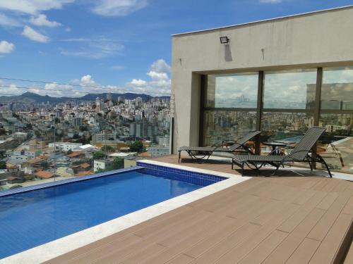 Swimming pool, Hotel Beaga Convention Expominas by MHB in Oeste