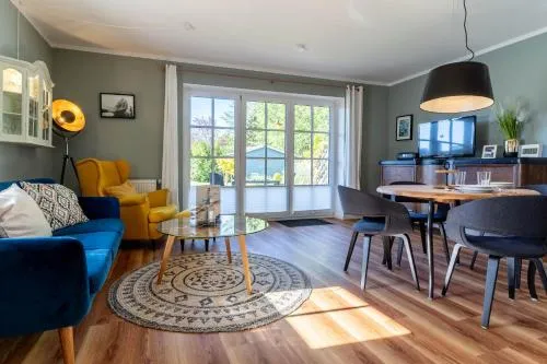 Ferienhaus Süderpiep – 4 individuelle Ferienwohnungen nahe Südstrand Ferienwohnung Seestern – stilvolles Erdgeschossdomizil mit Terrasse in St. Peter-Ording, Deutschland
