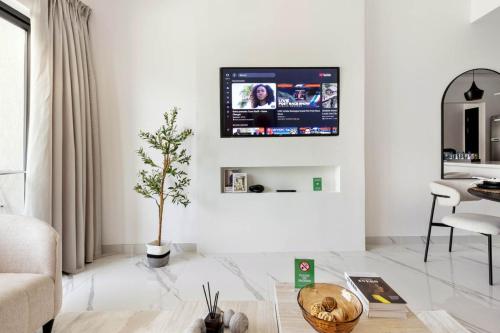 New 1BR with Full Balcony Gym Pool and Sauna - image 7