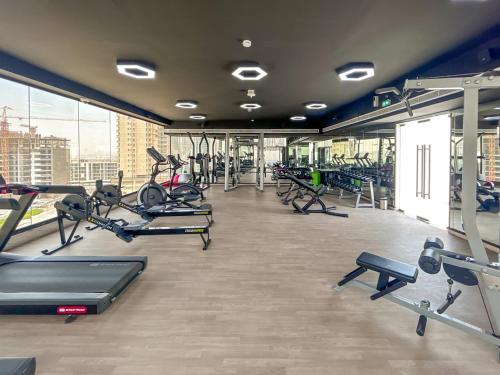 New 1BR with Full Balcony Gym Pool and Sauna - image 12
