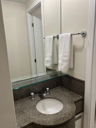 Elegance Suites Congonhas - Tap to explore photos