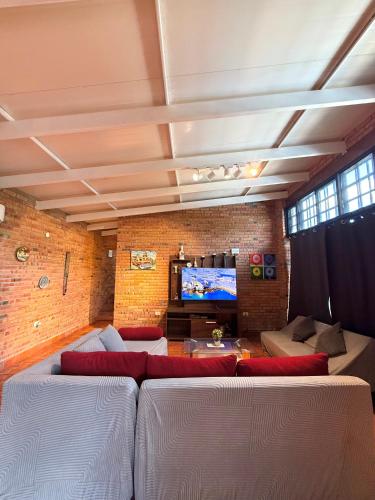 sala de TV, Mestre Pádel House (Mestre Padel House) in Ypacaraí